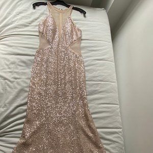 Elegant and classy sequin night gown. Aidan Mattox